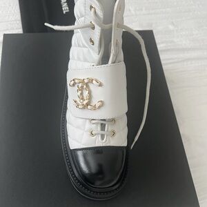 CHANEL Women's Quilted White and Black Lace-Up Boots